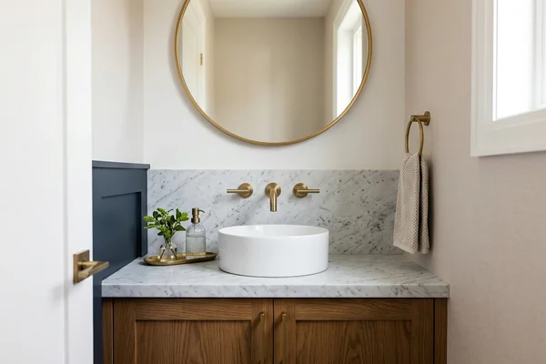 High Park powder room with a Carrara marble vanity